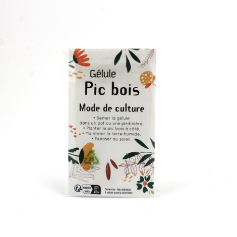 Sachet transparent rectangulaire avec fond imprimé floral, contenant une notice d’utilisation.