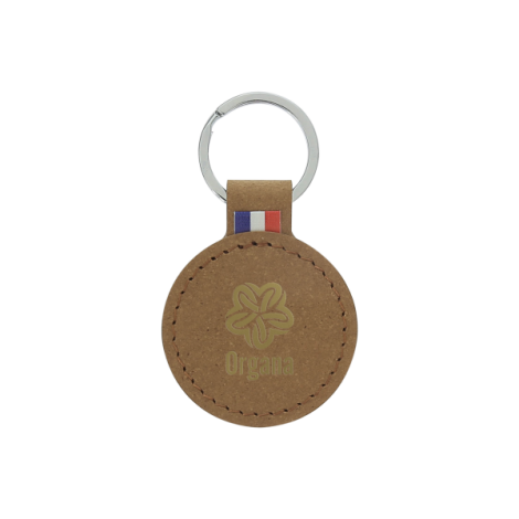 Porte-clés rond marron clair avec marquage vert centré