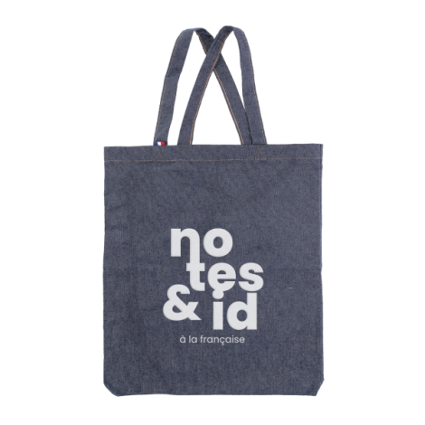 Tote bag à dos denim bleu avec marquage blanc centré notes et id