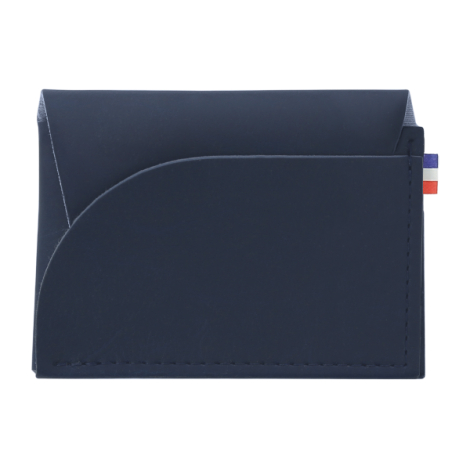 Porte-monnaie bleu marine vue face avec poche arrondie et coutures visibles, sans contenu