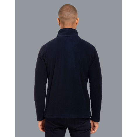 Veste polaire homme vue de dos portée col montant coupe droite manches longues bleue marine.