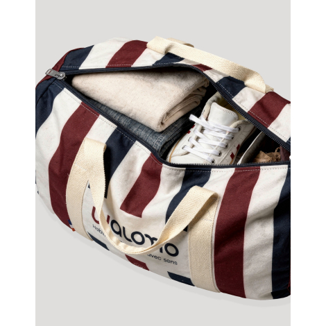 Sac polochon canvas polyester ouvert contenu vêtements chaussures motif rayé marquage visible sur l’ensemble du sac