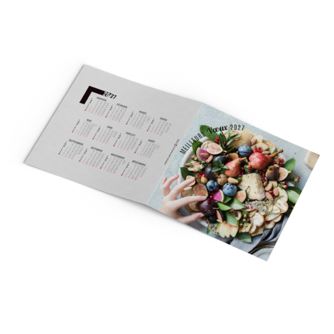 Carte de vœux gastronomique avec message « Meilleurs Vœux 2027 » sur photographie culinaire.