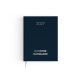 Agenda format voyage fermé avec couverture bleue effet naturel et signet textile blanc