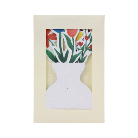 Calendrier en papier à planter avec bouquet de fleurs, présenté dans son étui à fenêtre transparente.